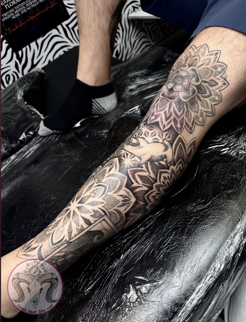 Full-leg dotwork mandala sleeve with a rose and wolf
