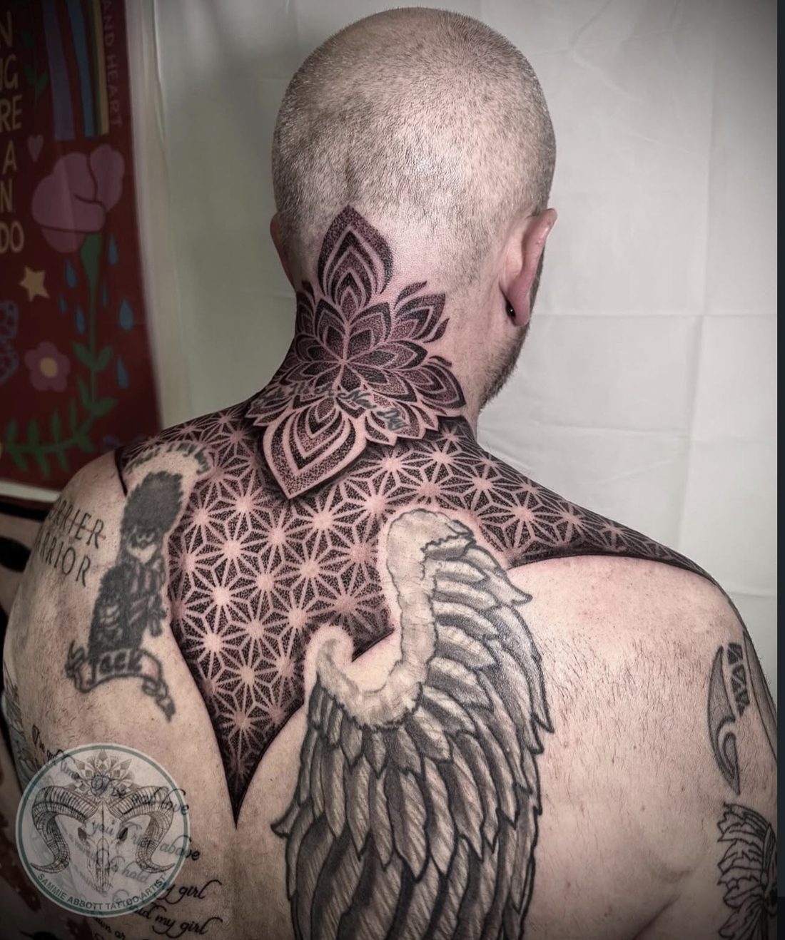 Geometric neck and upper back piece with wing